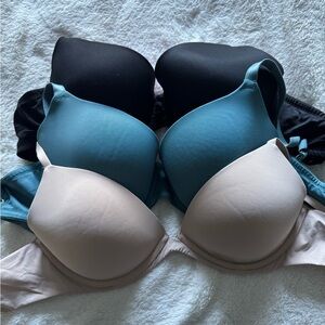 Victoria's Secret Black, Teal, and Cream Bra Trio